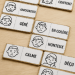 Jeu de dominos représentant différentes émotions avec des visages expressifs pour enfants.